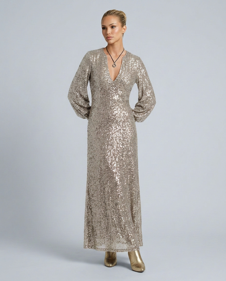 Shimmering sequin V-neck formal dress for women, a long sleeve maxi gown perfect for luxurious parties.