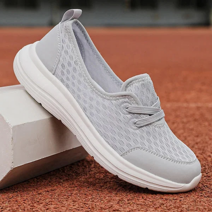 Close-up of women's lace-up orthopedic walking shoes with cushioned platform sole for ultimate comfort.
