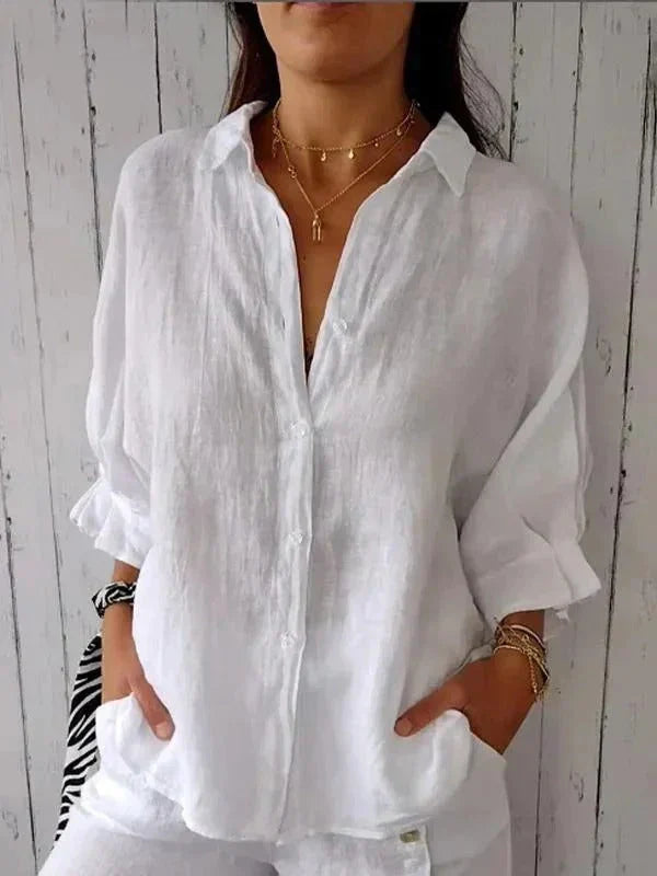 Stylish women's oversized linen shirt, relaxed fit, button-down with rolled sleeves, perfect for spring/summer.