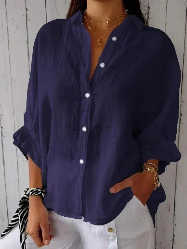 Versatile women's casual linen button-down shirt with rolled sleeves, ideal for beachwear or everyday style.