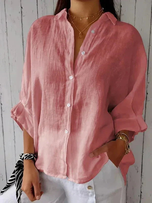 Summer-ready women's linen shirt, relaxed fit, button-down with stylish rolled sleeves, perfect for sunny days.
