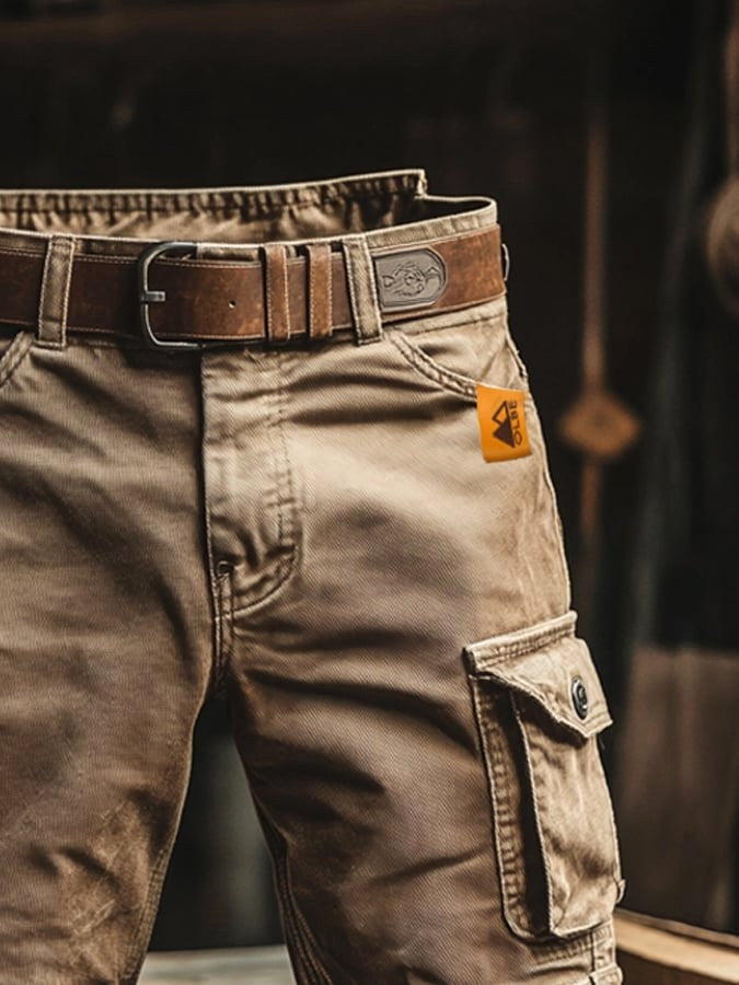 Khaki men's durable cargo trousers with a relaxed fit, designed for comfort during outdoor adventures.