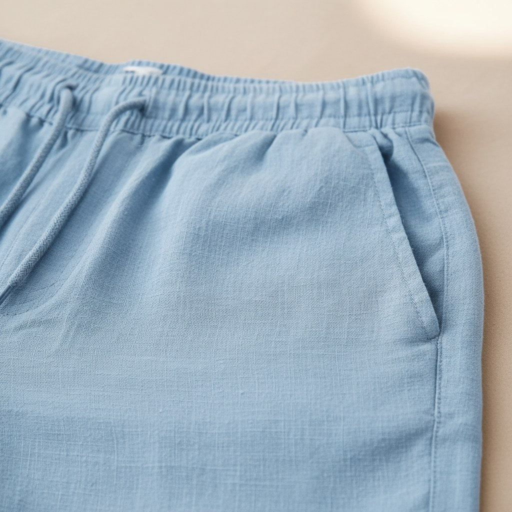 Practical men's relaxed fit shorts with a drawstring, perfect for everyday comfort during warm weather.