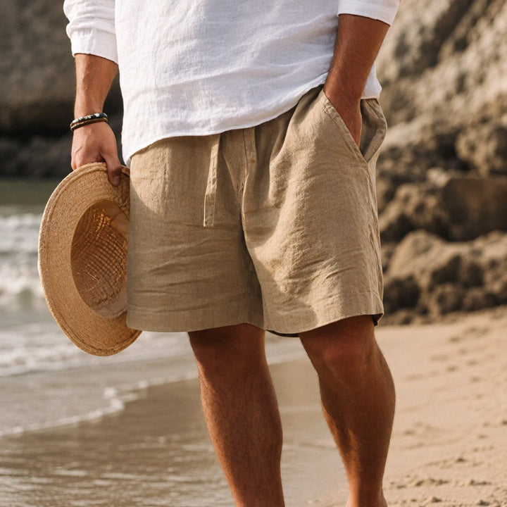 Versatile men's summer shorts with a relaxed fit and drawstring, ideal for travel or daily wear.