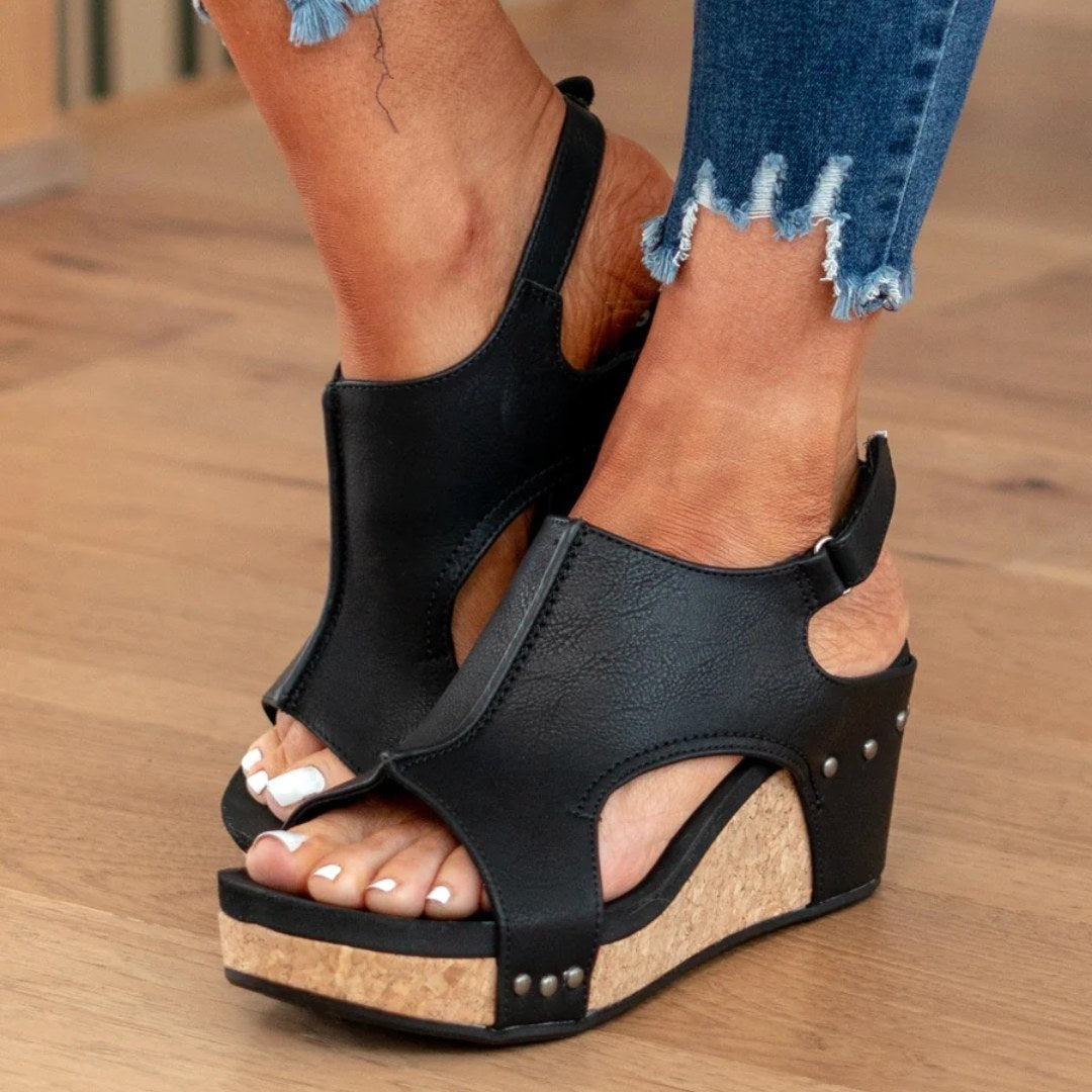 Chic women's comfortable wedge sandals. Open-toe slip-on summer footwear, ideal for versatile dressy or casual events.