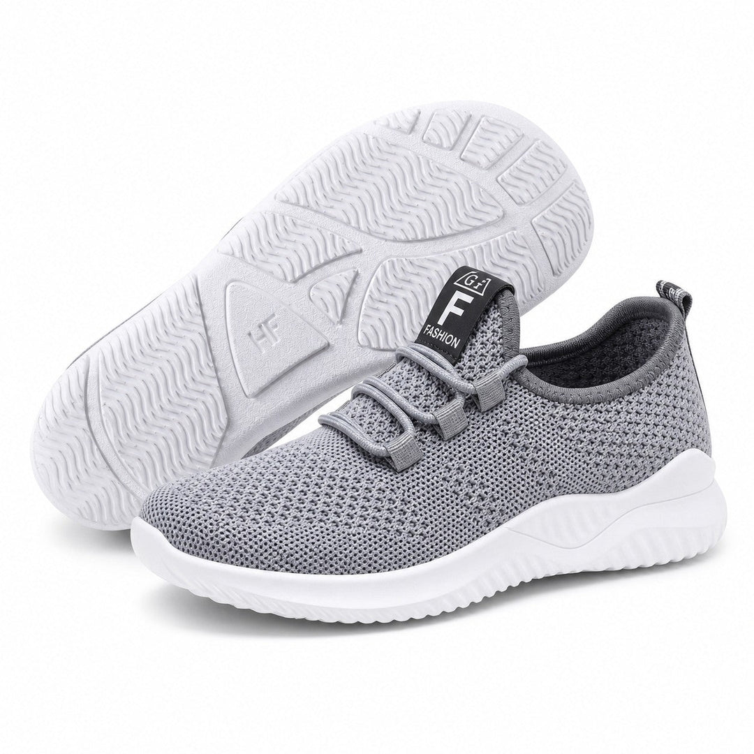 Women's casual sneakers in a neutral tone, offering lightweight support for everyday adventures.
