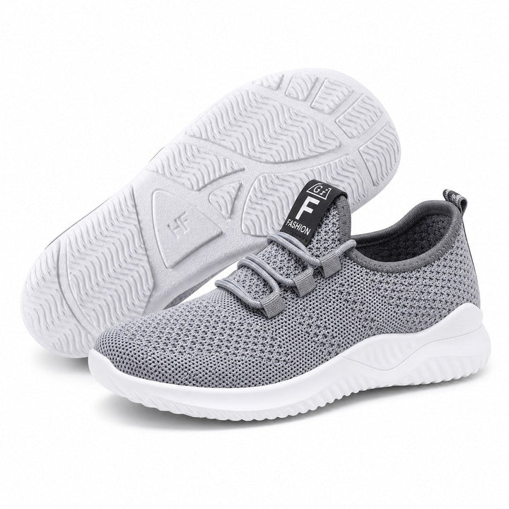 Women's casual sneakers in a neutral tone, offering lightweight support for everyday adventures.
