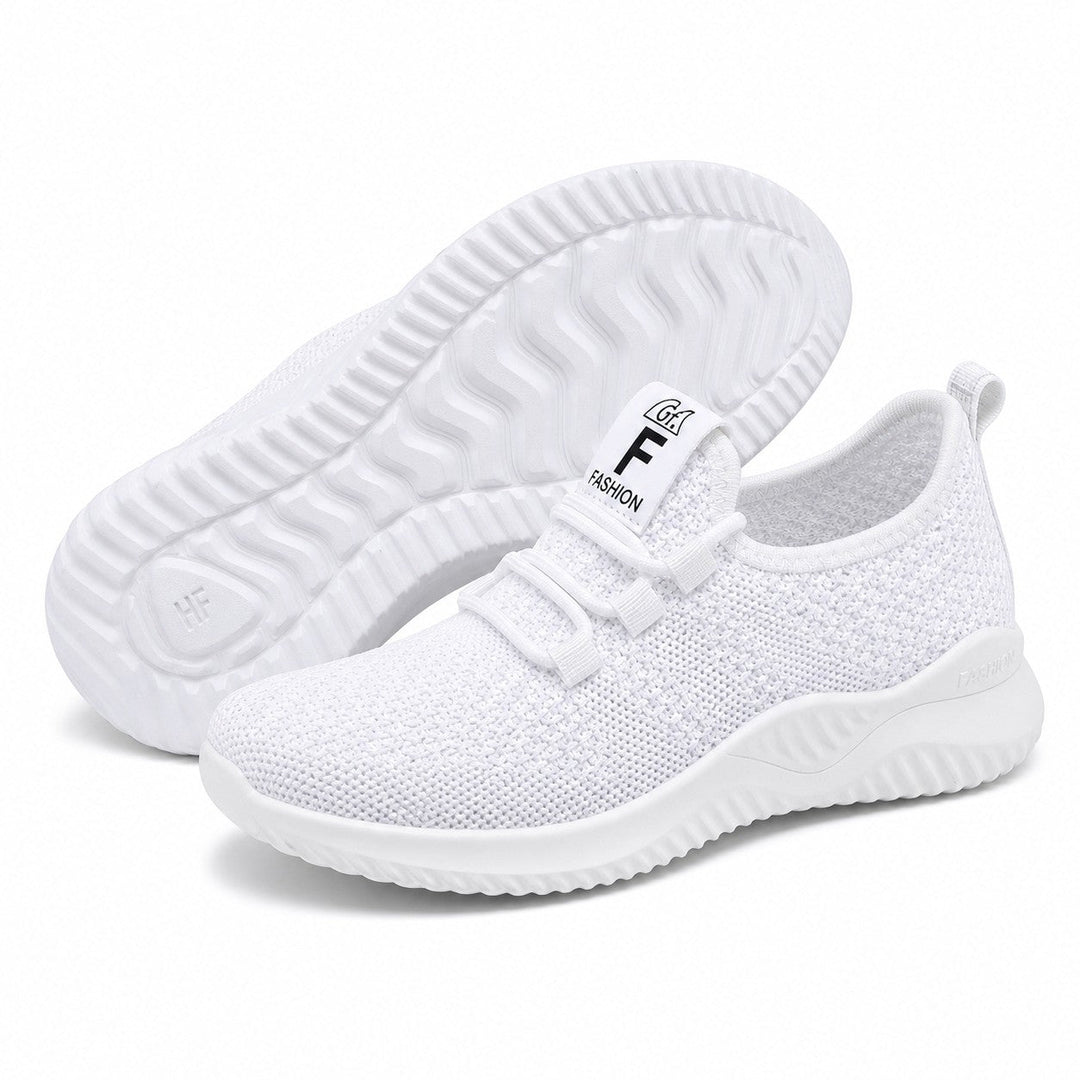 Pair of women's versatile sneakers, showcasing their lightweight build and suitability for everyday wear.