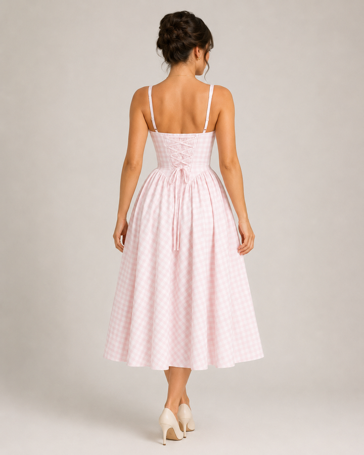 Pink gingham A-line midi dress for women, perfect for summer brunch or casual parties. Features pockets.