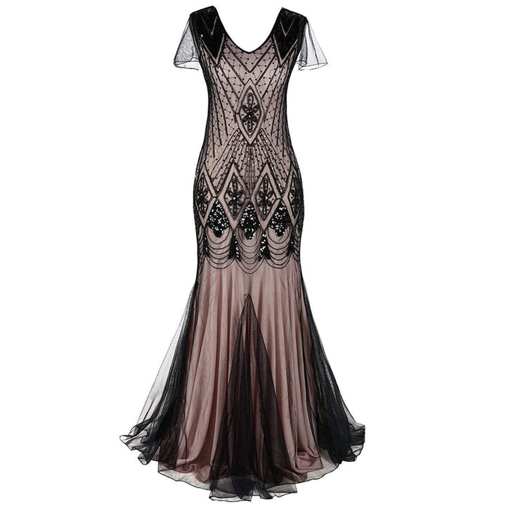 Elegant long 1920s flapper dress with sparkling sequins, vintage style women's fashion for parties.