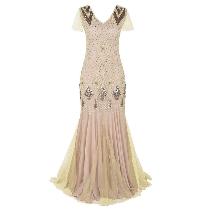 Women's long sequin flapper dress, vintage 1920s glamour for a Gatsby theme party or special occasion.
