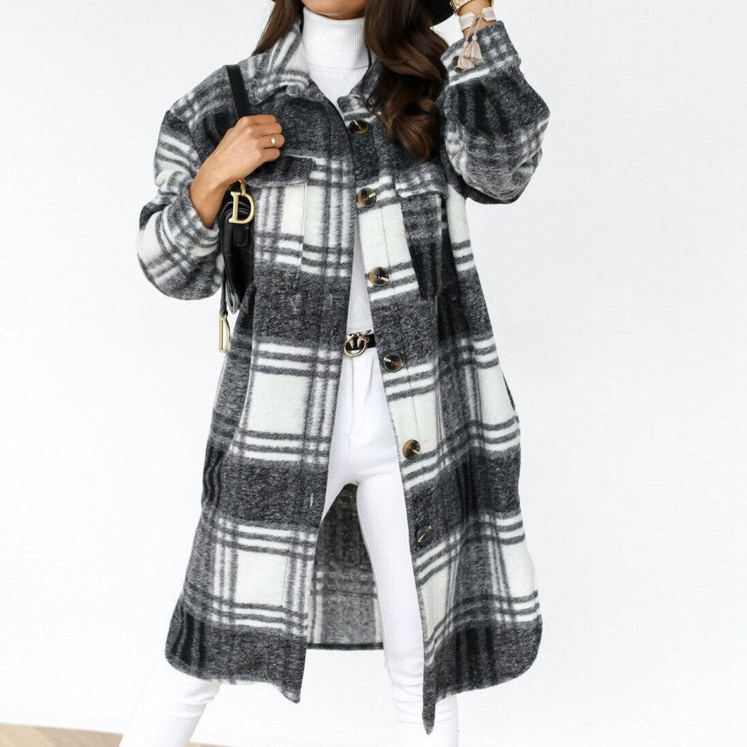 Versatile women's checked coat, a long, elegant outerwear piece for stylish cold weather fashion.