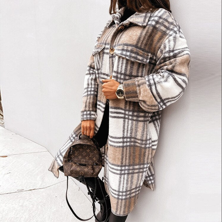Fashionable women's long checked coat, ideal elegant outerwear for winter and cold weather styling.