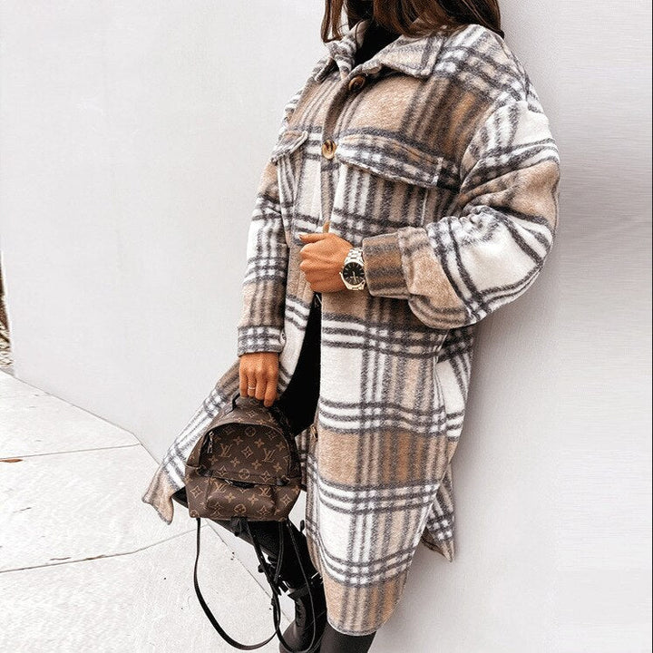 Fashionable women's long checked coat, ideal elegant outerwear for winter and cold weather styling.