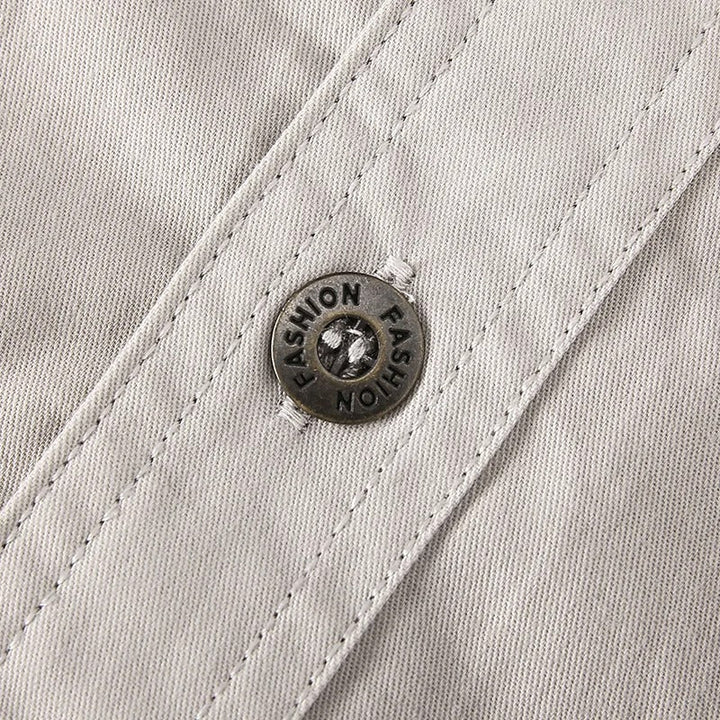 Stylish men's long sleeve button-up utility shirt, perfect for work or casual settings.