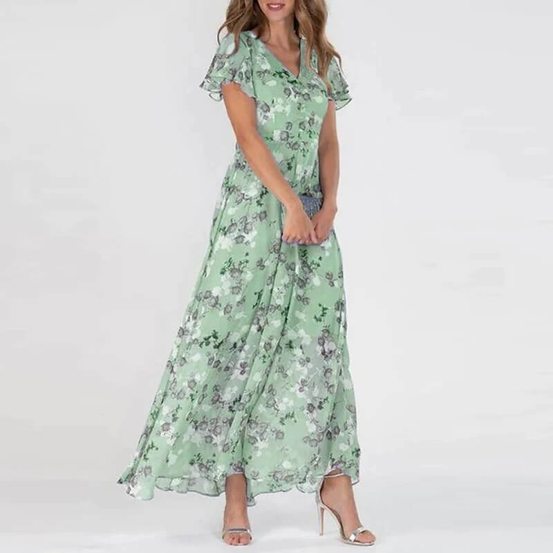 Women's elegant long floral summer dress with a flattering fit. Versatile casual or party maxi dress.