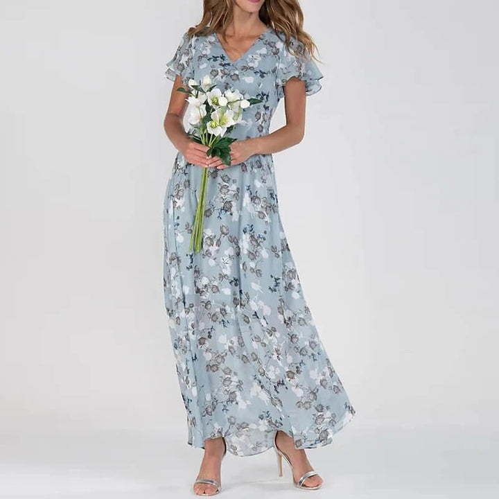 Beautiful long floral print maxi dress for women. Perfect elegant summer fashion with a comfortable fit.