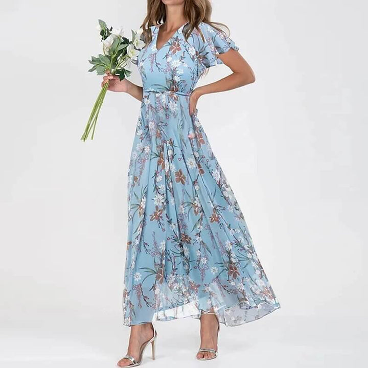 Stylish women's long floral summer dress. Elegant maxi for parties, vacation, or comfortable casual wear.