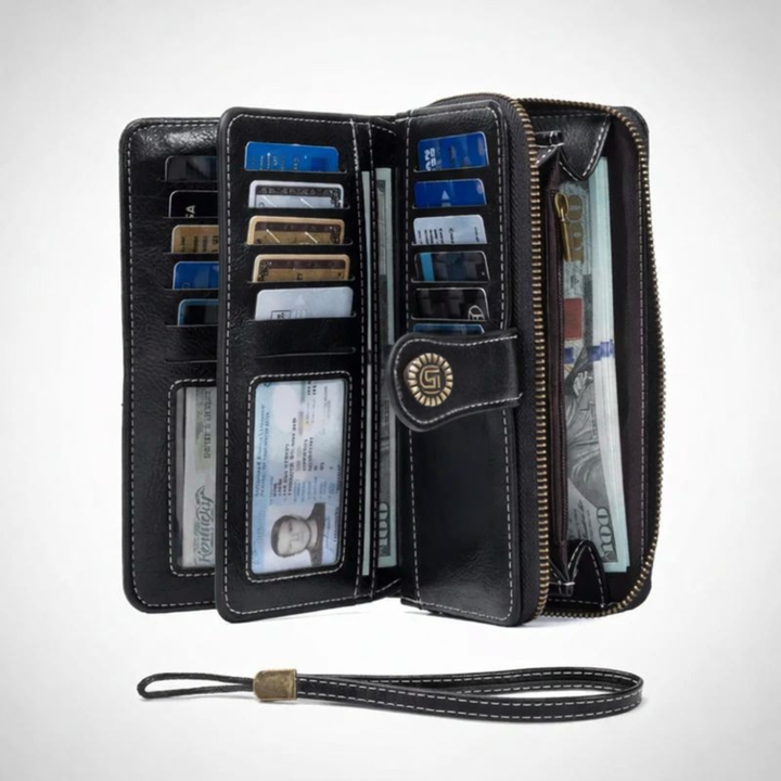 Stylish unisex long wallet featuring a full zip closure and essential RFID blocking technology. Holds cards & phone.