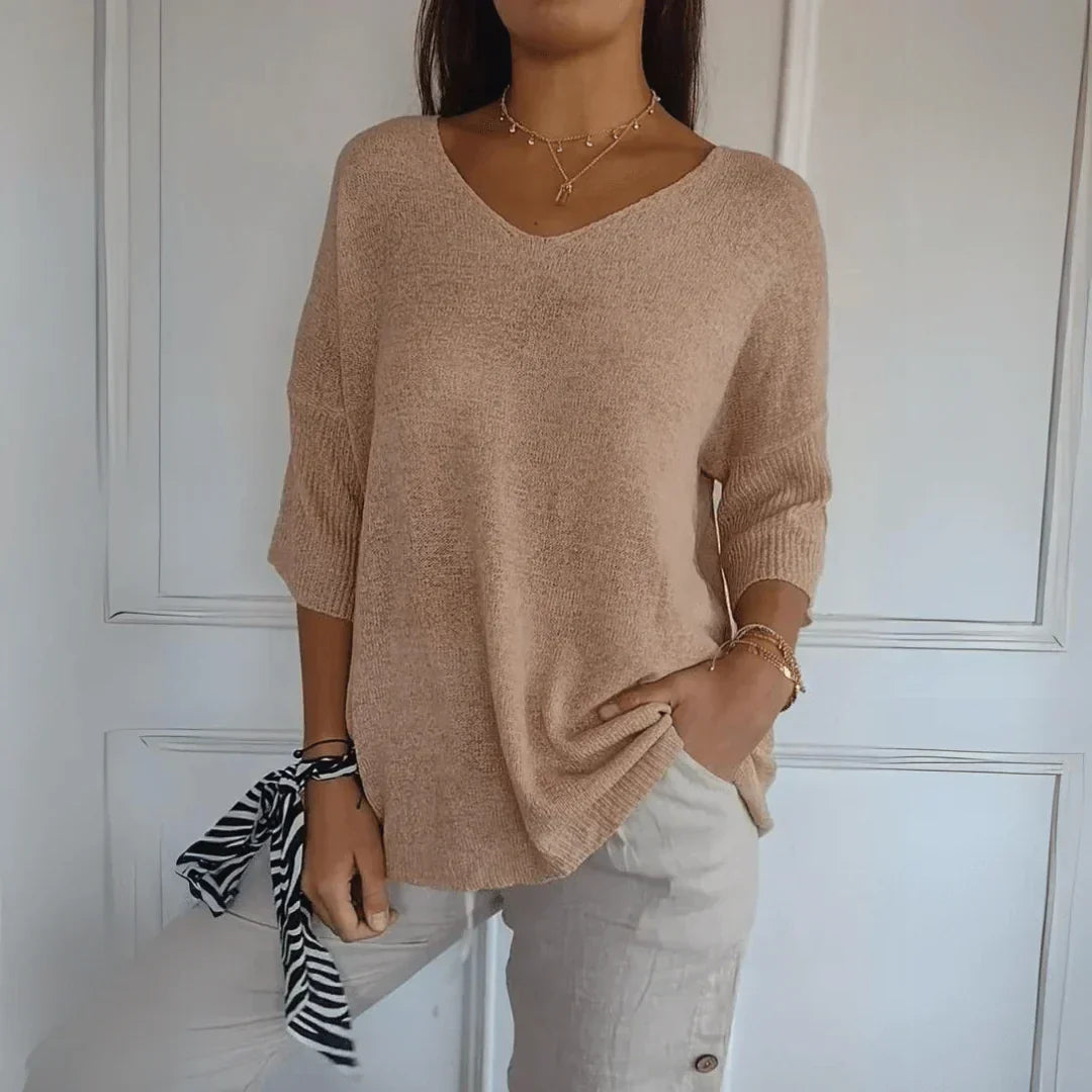 Soft knit women's top, sophisticated design for a comfortable fit. Stylish and elegant for daily outfits.