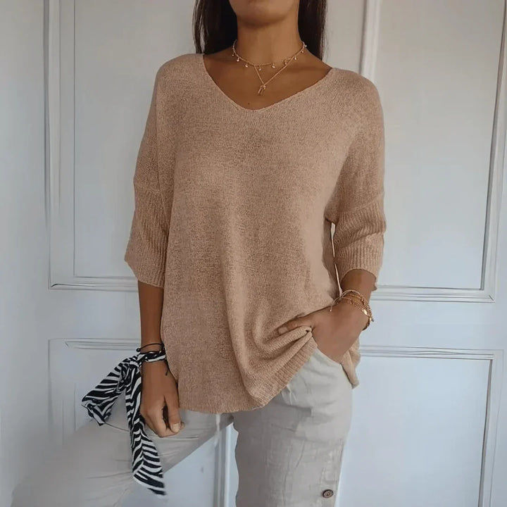 Soft knit women's top, sophisticated design for a comfortable fit. Stylish and elegant for daily outfits.