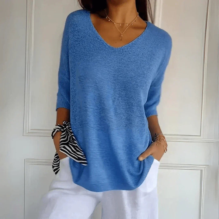 Versatile women's knit top. Elegant and stylish, ideal for effortless everyday wear or dressing up.