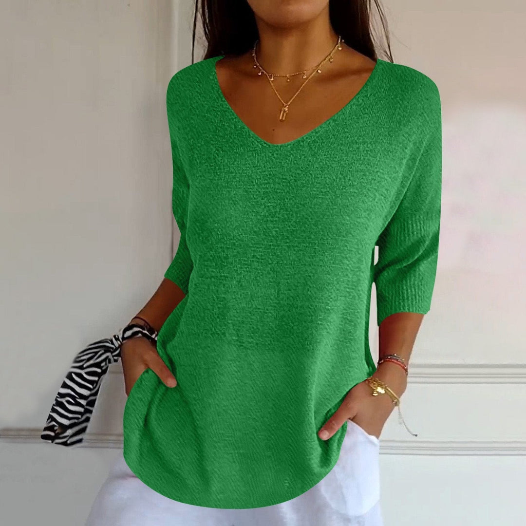 Comfortable women's knit shirt, a classic choice for everyday wear. Stylish and soft women's top.