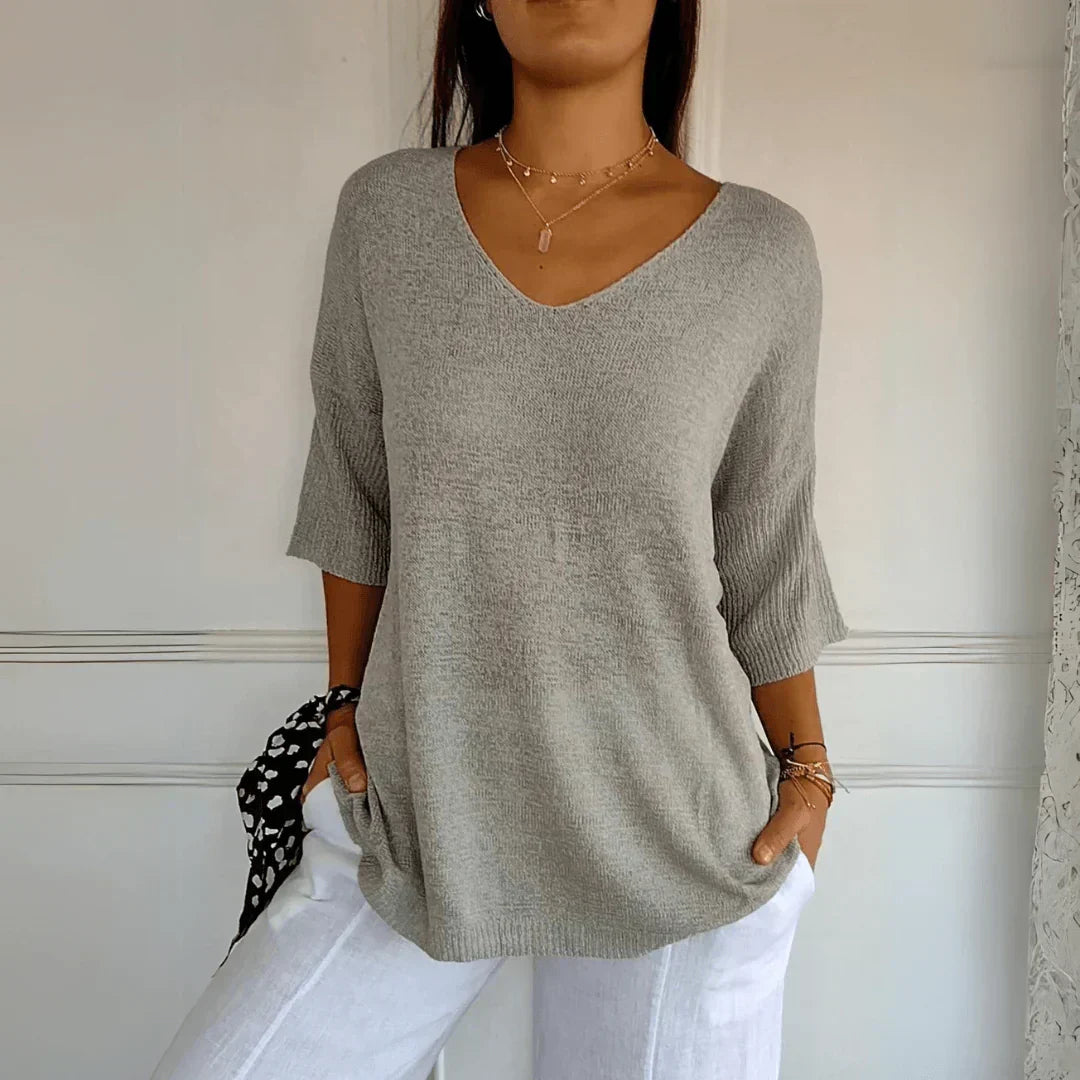 Chic women's knit shirt, simple yet sophisticated. An elegant & versatile top for any fashionista.