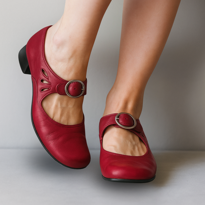 Comfortable Marisole women's rounded toe Mary Jane pumps. Features an elegant ankle strap and classic buckle closure.