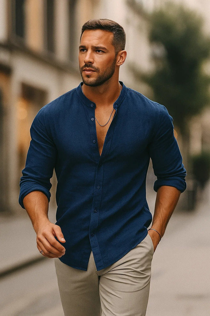 Relaxed fit men's casual shirt with a stylish grandad collar & long sleeves. Comfortable button-up for summer fashion.