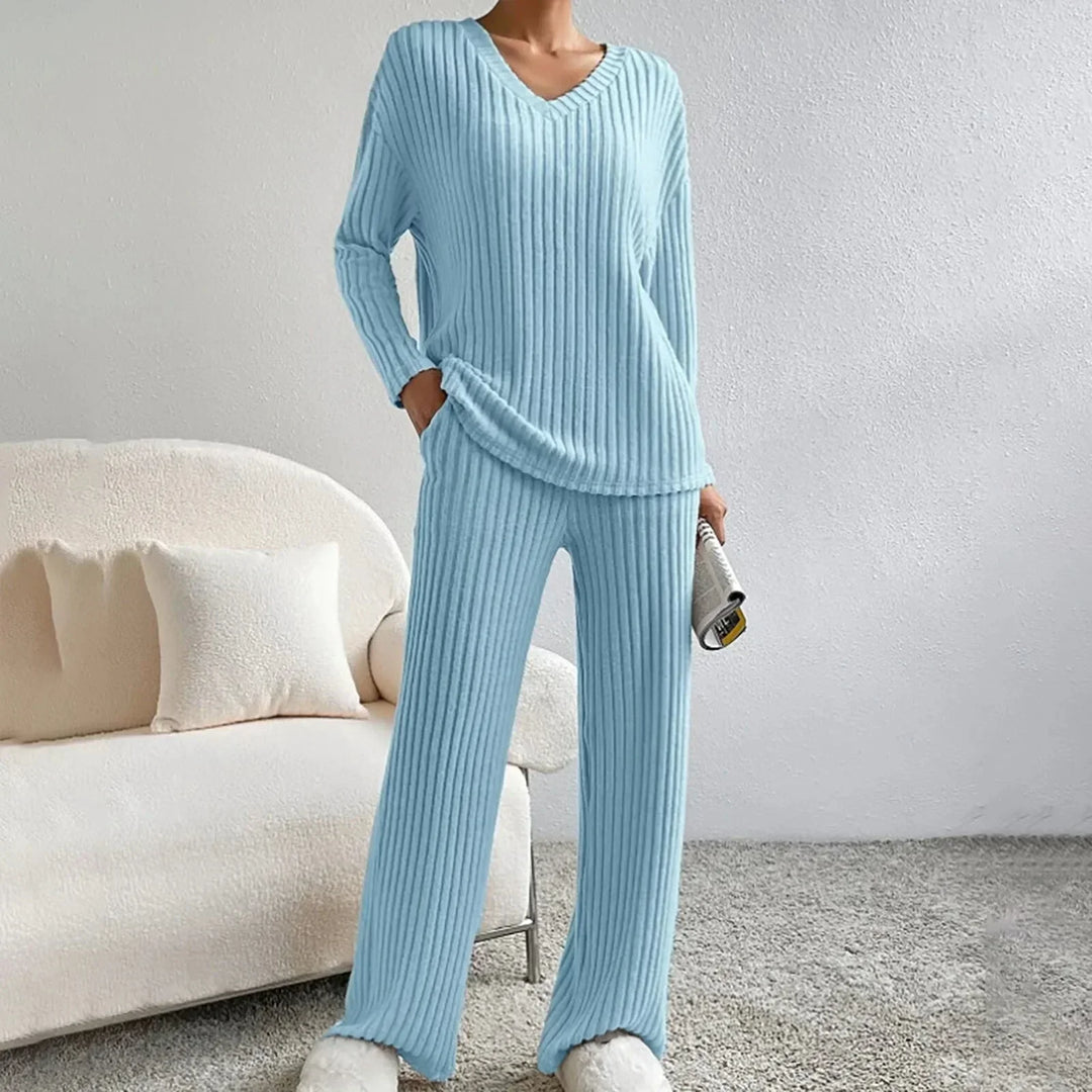 Women's v-neck loungewear top and matching wide leg pants set, designed for ultimate comfort and style.