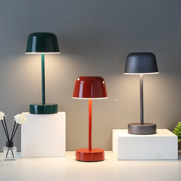 Portable dimmable LED table lamp, cordless, ideal as a modern bedroom or living room light.
