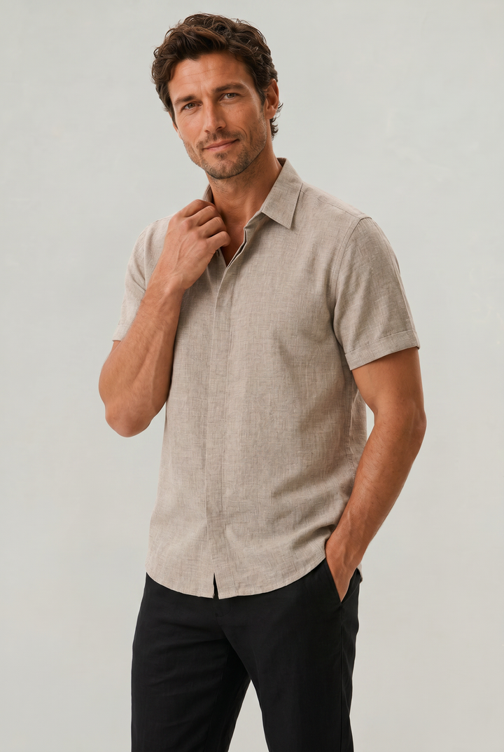 Elegant men's short sleeve shirt, textured for a refined casual look, perfect for warm weather.