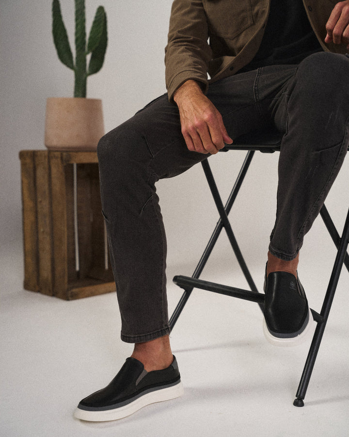 Close-up of men's orthopedic walking shoe's cushioned sole, providing ultimate support.