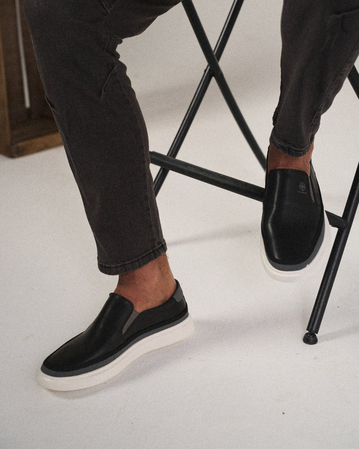 Side profile of Men's Refined Cushioned Orthopedic Slip-On Walking Shoe, showing comfort design.