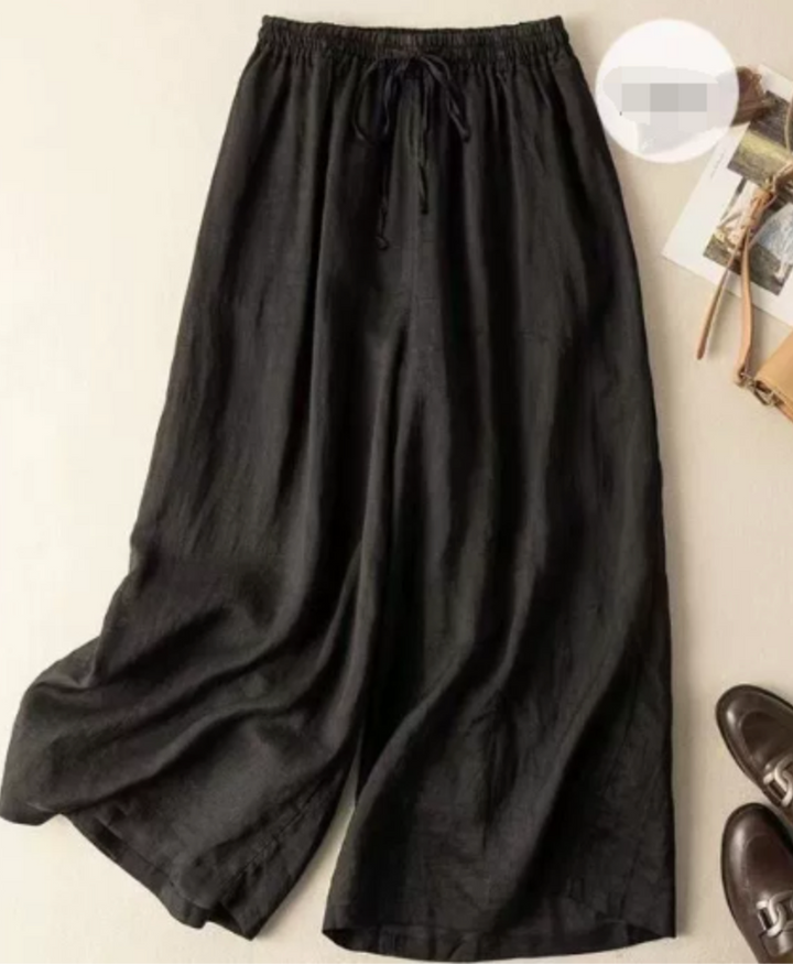 Women's effortless wide leg pull on pants in black, perfect for comfortable casual wear and a relaxed summer style.