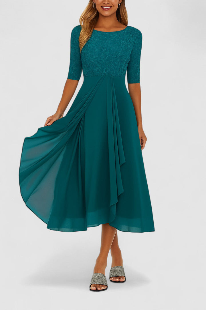 Stunning race day dress, elegant embroidered bodice, and a graceful draped skirt for a sophisticated look.