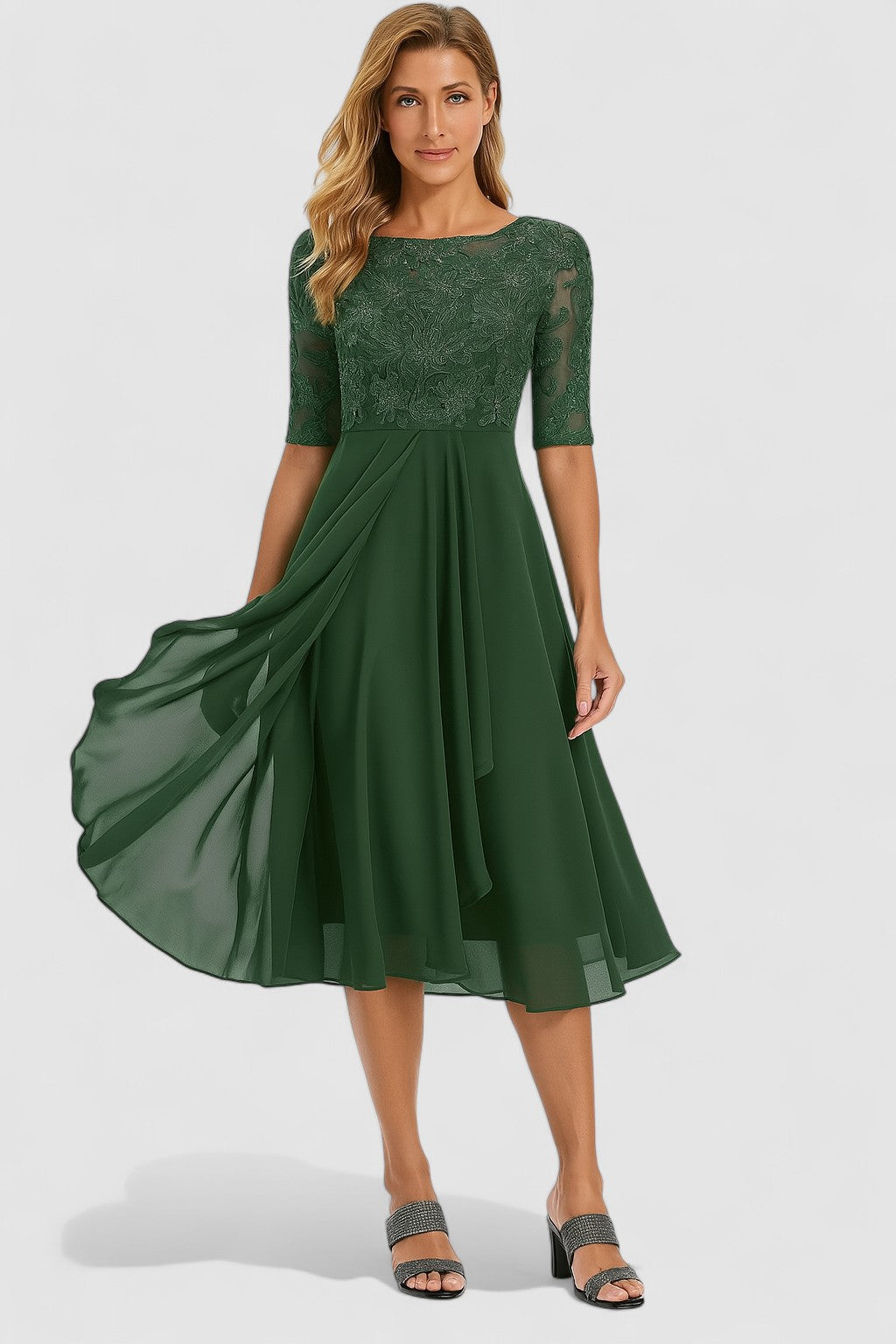 Elegant women's special occasion dress, sophisticated A-line cut, half sleeves & a beautifully draped skirt.