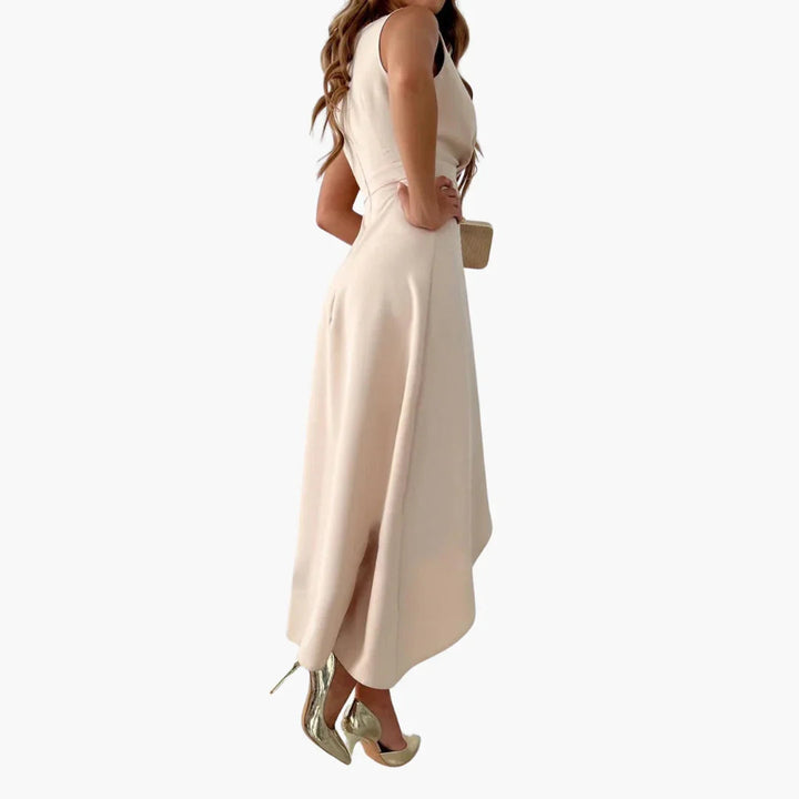 Stylish women's beige midi wrap dress, featuring a V-neck and ruffled hem, ideal for races, parties & day wear.