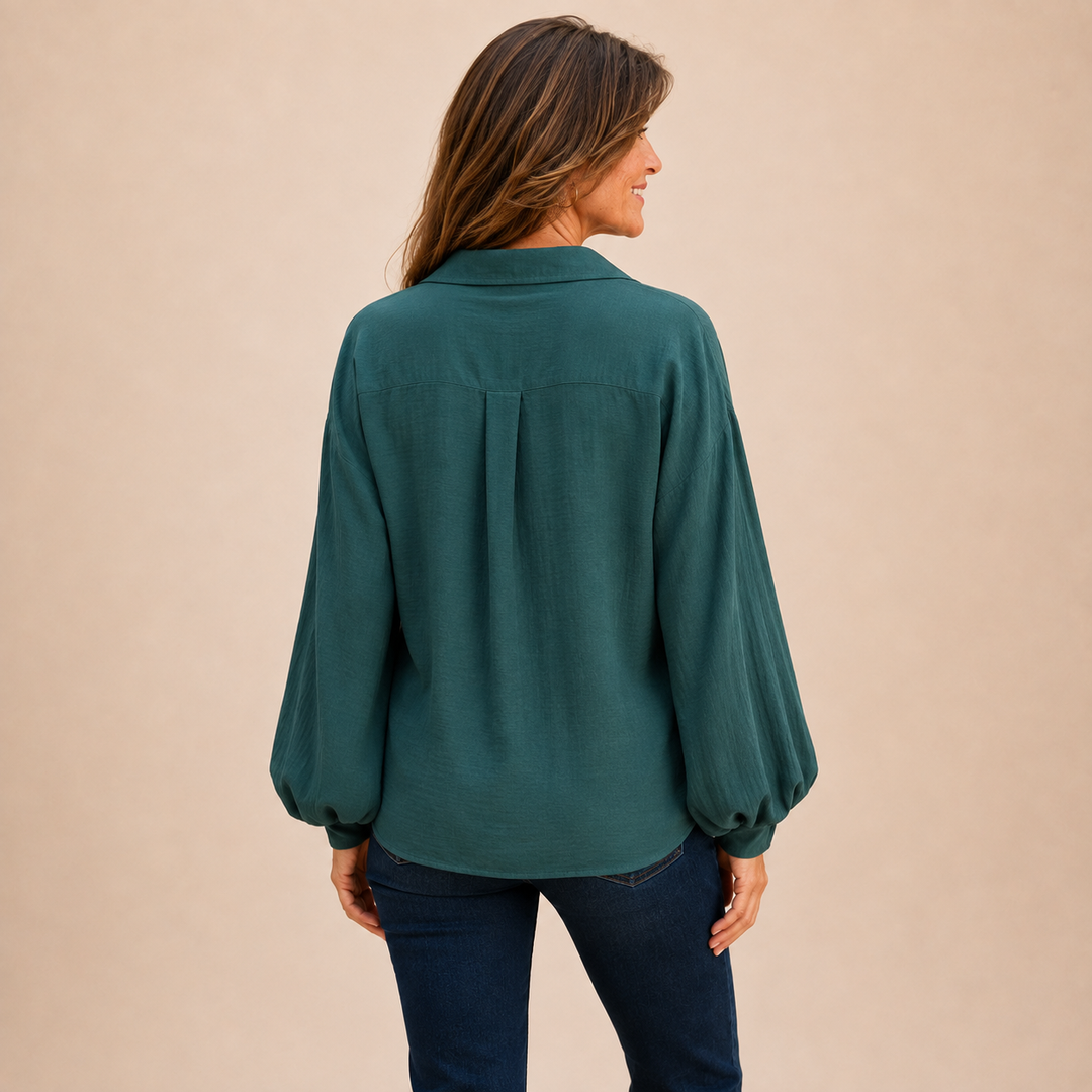 Comfortable relaxed fit women's button-down blouse. Long sleeve collared shirt, great for everyday wear.