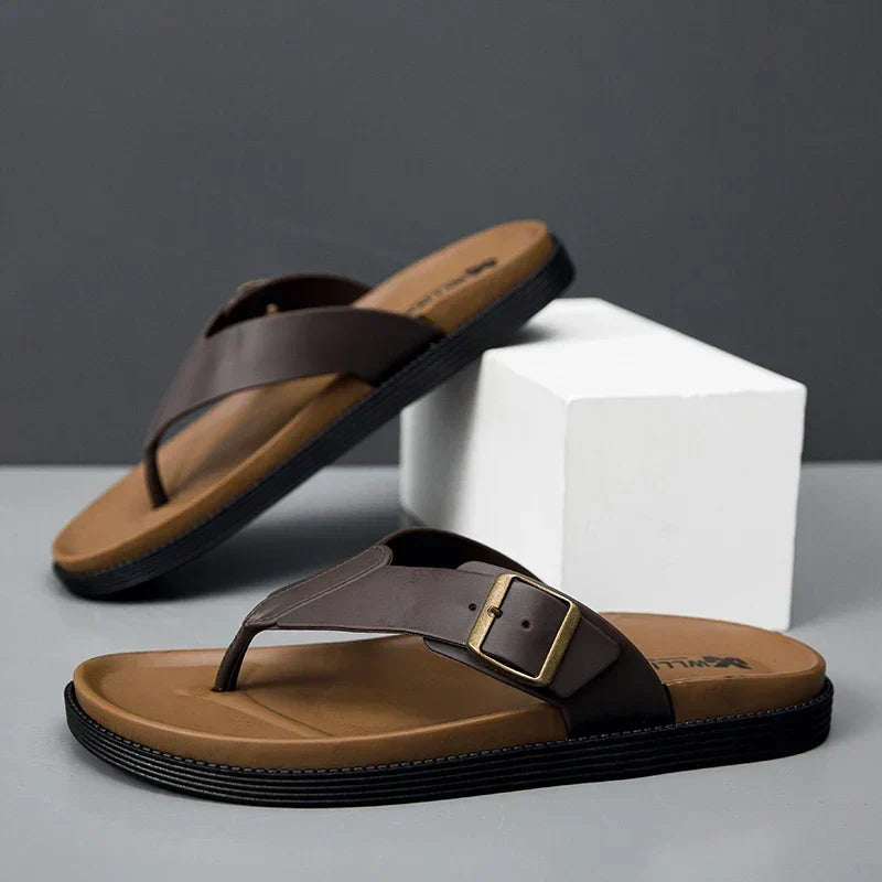 Men's stylish buckle thong slides, perfect for warm-weather casual comfort.