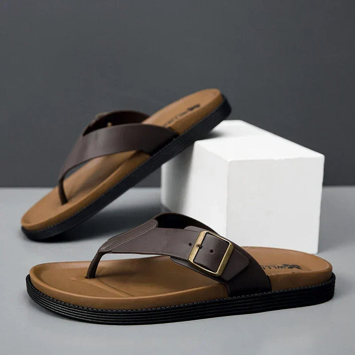 Men's stylish buckle thong slides, perfect for warm-weather casual comfort.