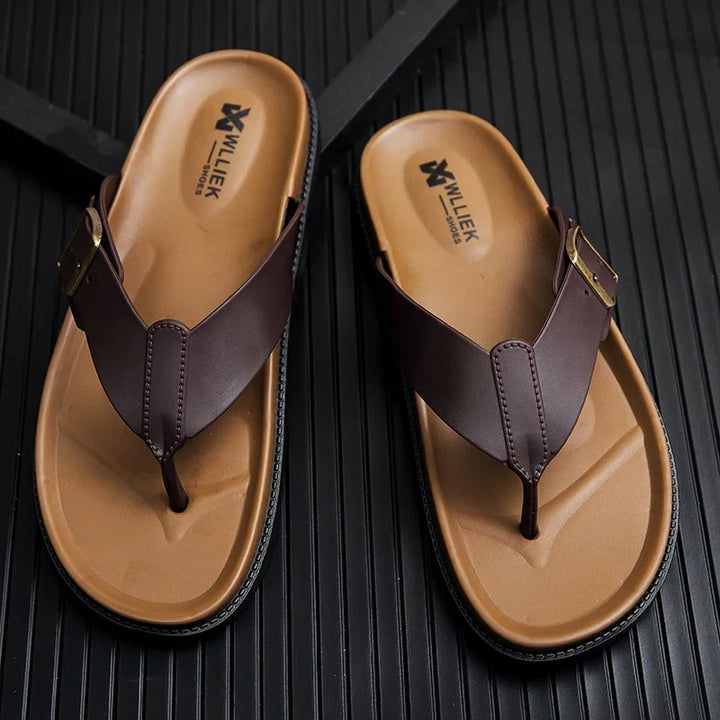 Stylish men's buckle thong slides with modern design for effortless warm-weather comfort.