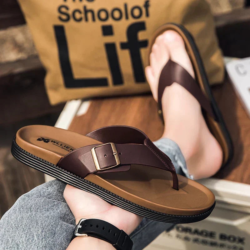 Easy-to-wear men's buckle thong sandals, ultimate summer footwear for comfort and contemporary style.