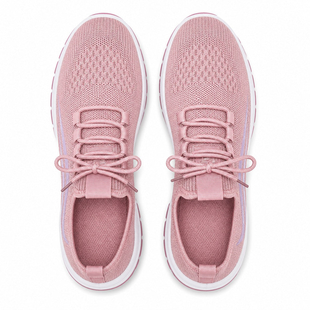 Women's footwear: everyday soft sole sneakers, offering comfort & flexibility.