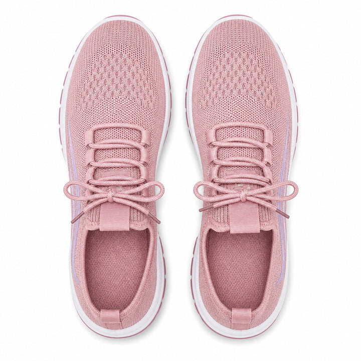 Women's footwear: everyday soft sole sneakers, offering comfort & flexibility.