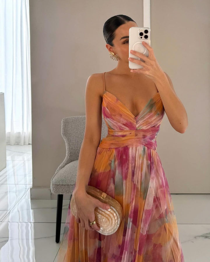 Vibrant women's A-line watercolor maxi dress, perfect for elegant summer fashion and comfort.