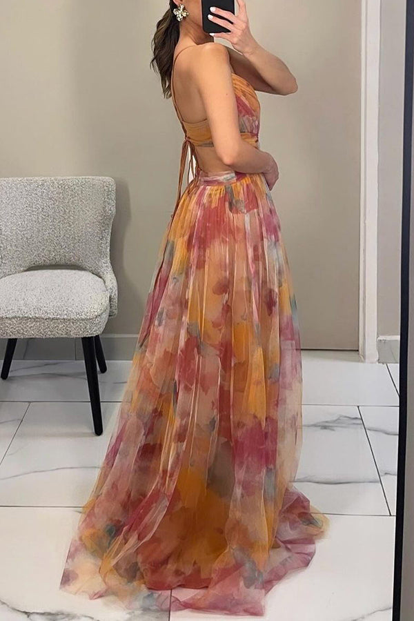 Women's summer fashion A-line maxi dress with an elegant watercolor print & spaghetti strap detail.