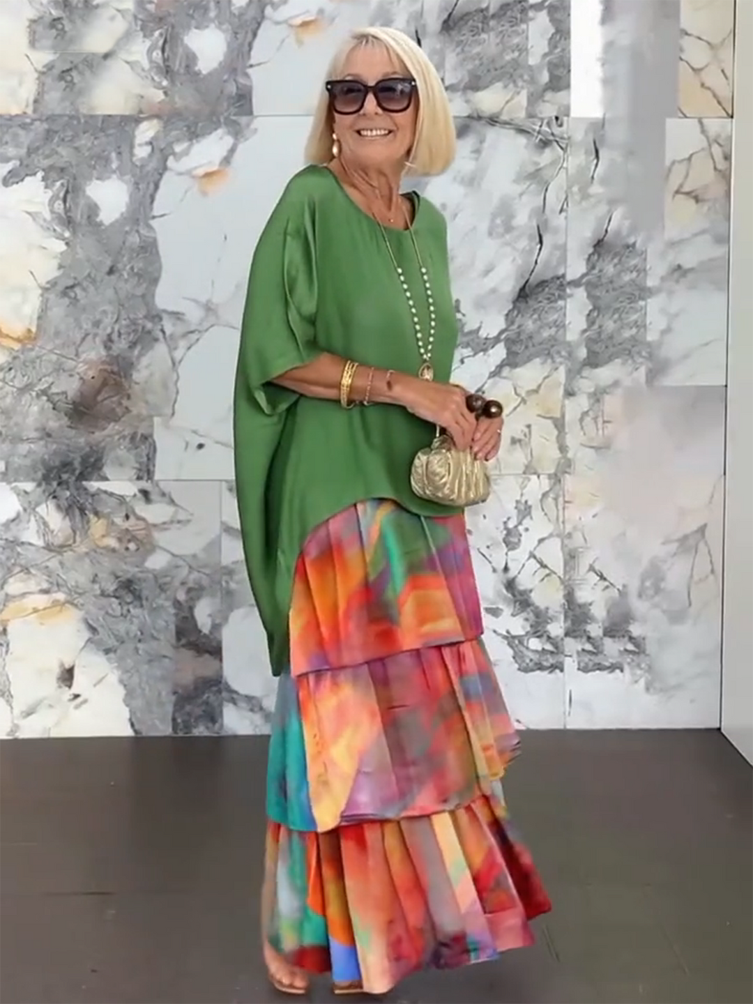 Women's fashionable tiered ruffle batwing sleeve maxi dress, perfect for summer.