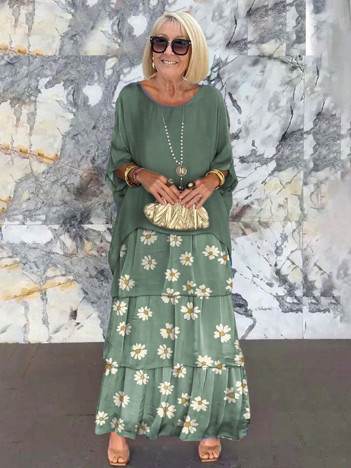 Chic women's cocktail dress, elegant tiered ruffles and comfortable batwing sleeves.